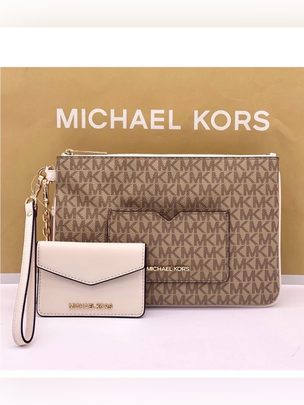 Michael Kors Beige Logo Wristlet with Pink Trim